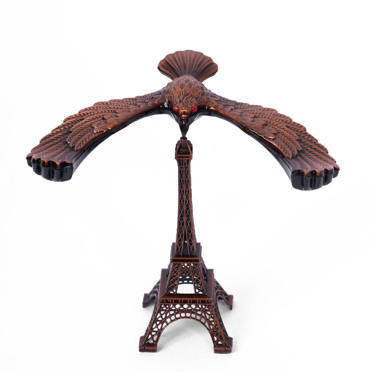 Handcrafted wooden eagle and Eiffel Tower sculpture front display